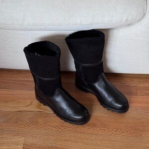 La Canadienne Leather and Suede
Shearling Asymmetrical Mid Calf Black Boots